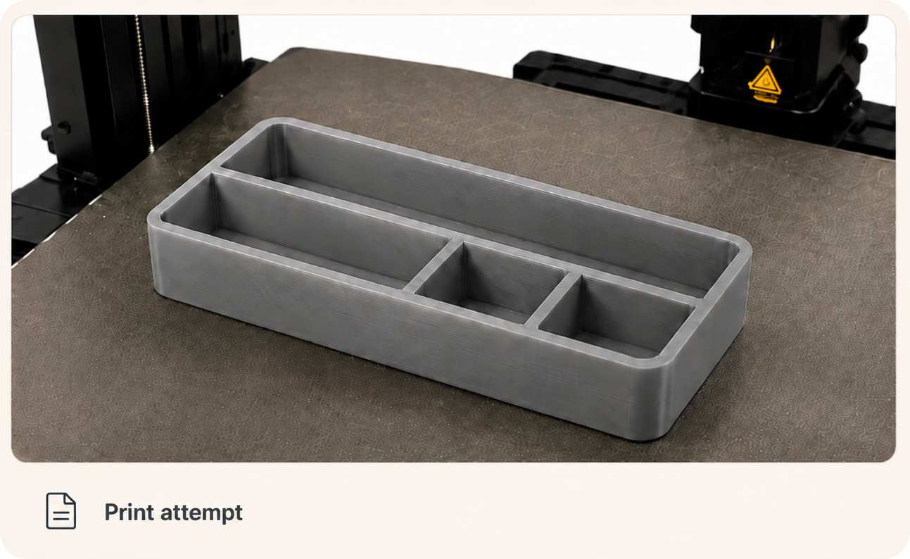 A print attempt card showing the desk tray on a 3D printer bed.